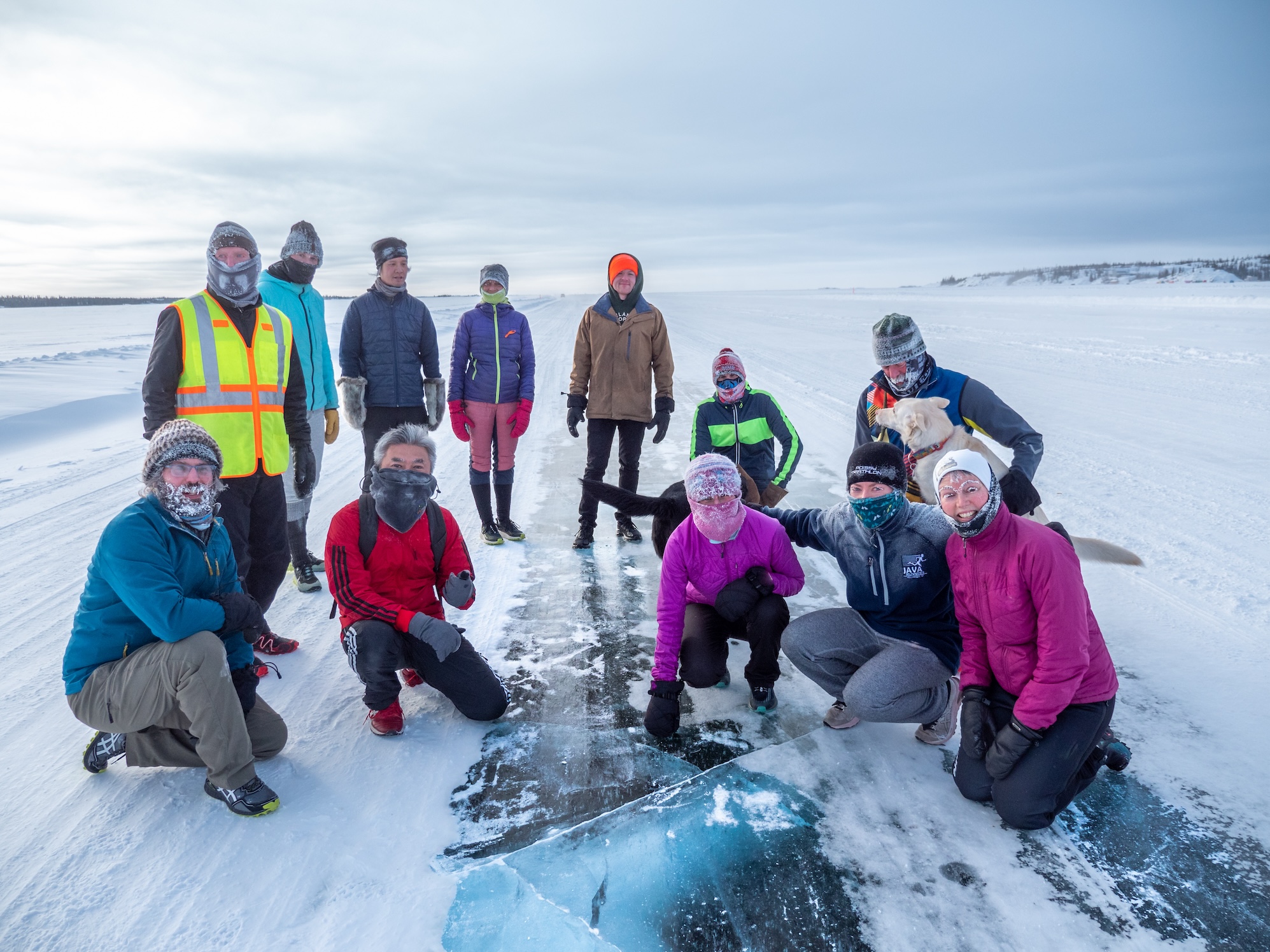 A running group on the ice road in Yellowknife NWT_. Photo Mike Lee